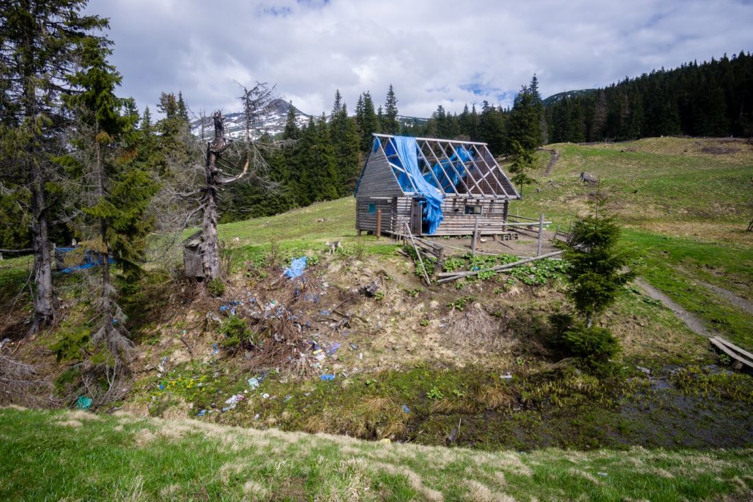 Waste lying around - dark face of ukrainian mountains.